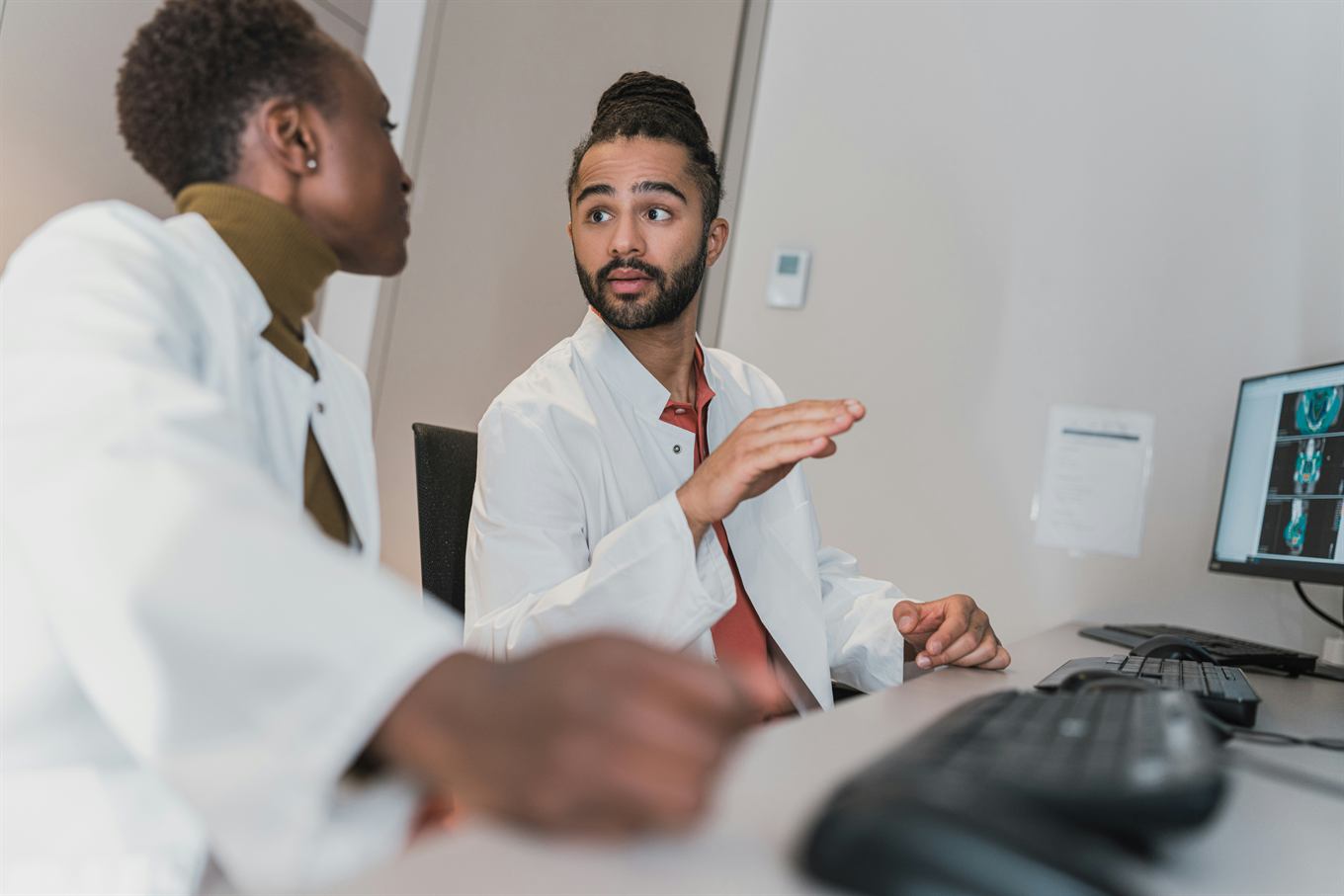 Two dentists discussing a treatment plan